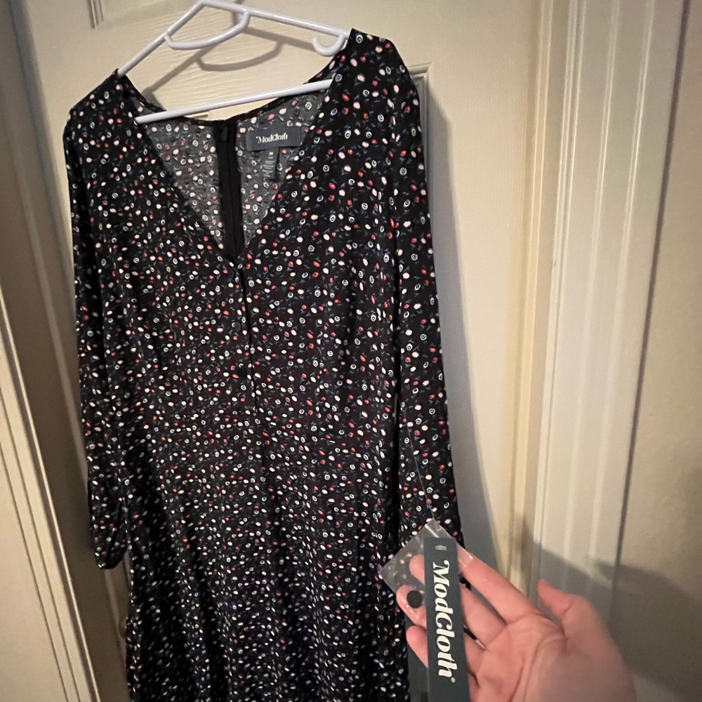 Sweetest little dress, with delicate flowers and design. Brand new, modcloth